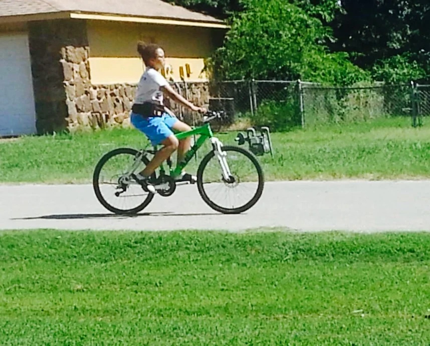 girl riding her bike