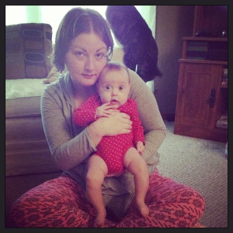 mother holding new born baby