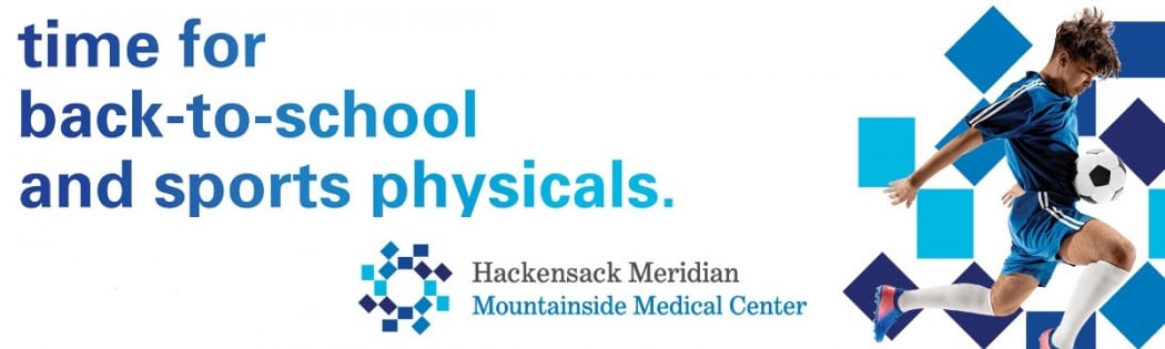 boy kicking a soccer ball