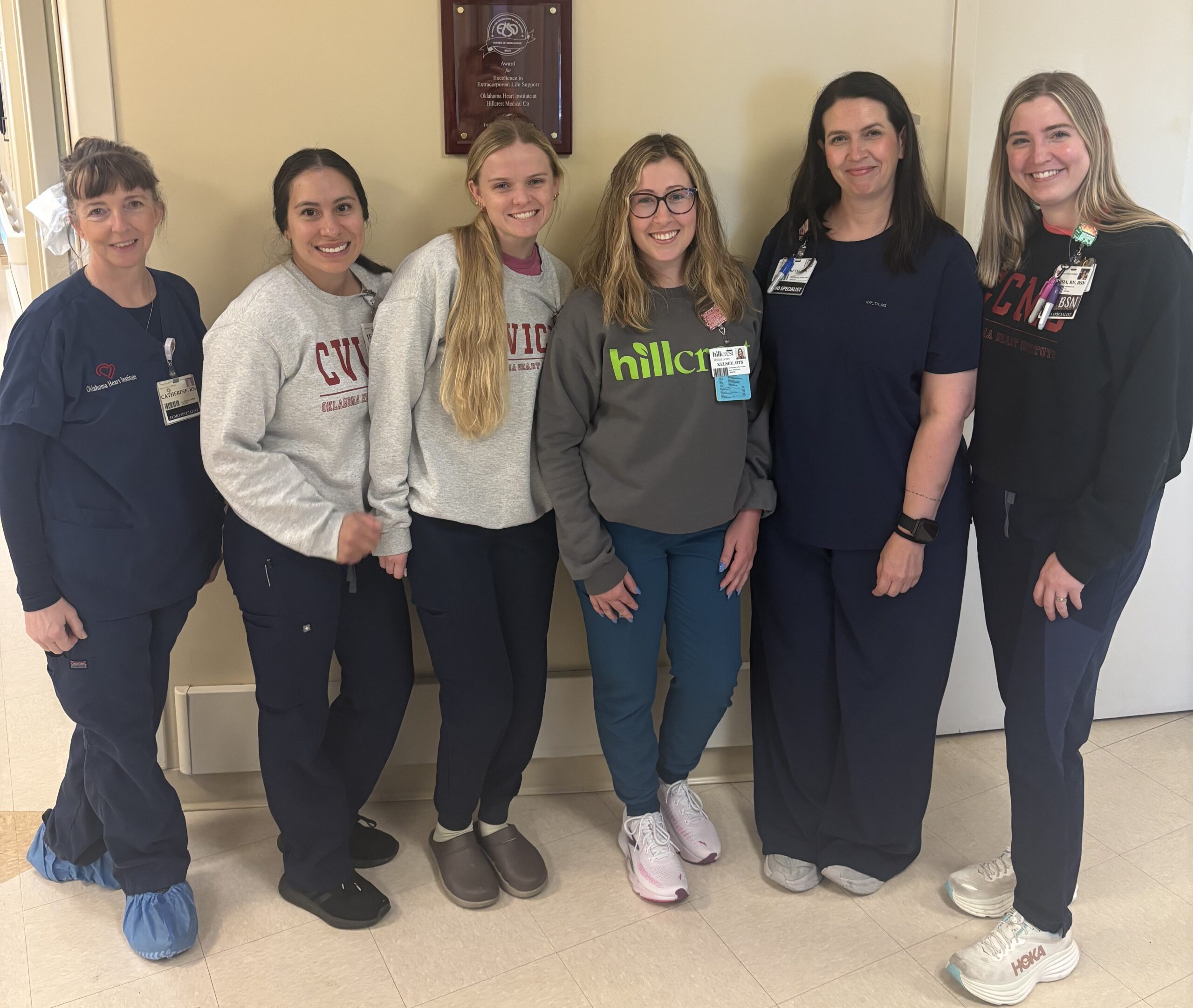 Kelsey Carter visiting with OHI cardiovascular intensive care unit staff.