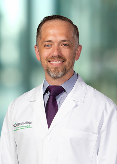 Travis Griffiths, M.D.