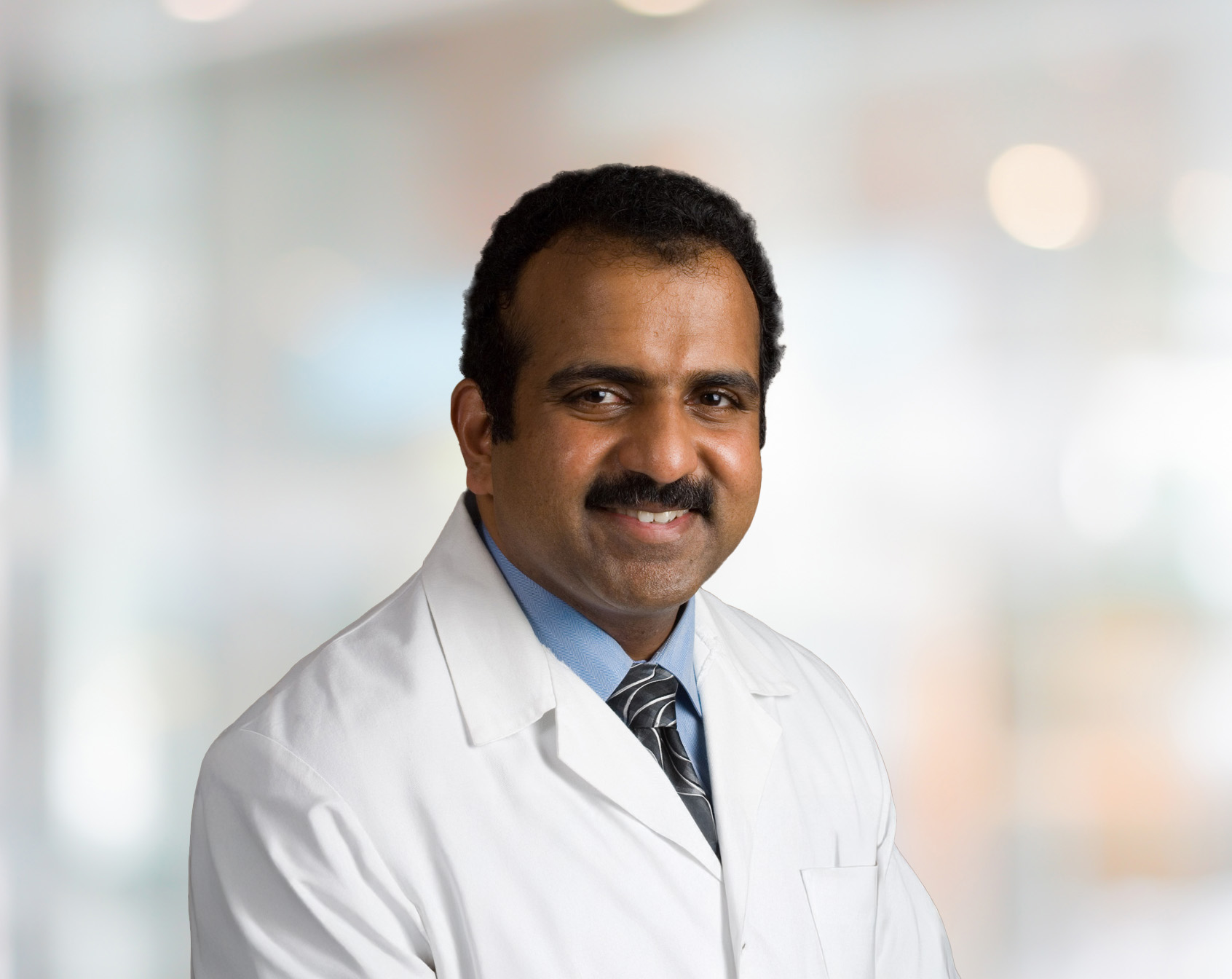 Ajit K. Tharakan, M.D.