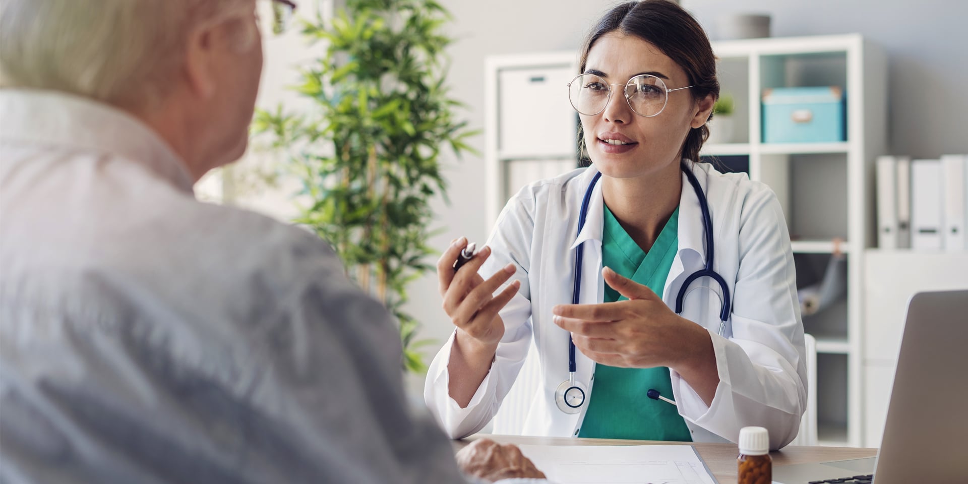 Female doctor talking to a patient.