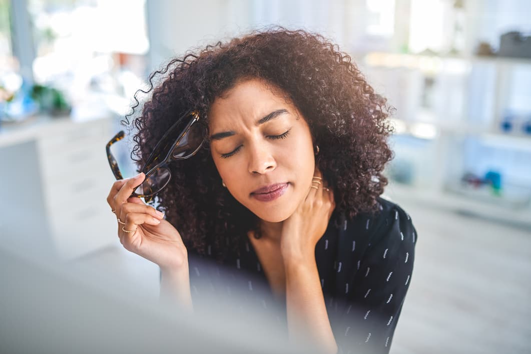 Woman with neck pain to represent her pain management symptoms.