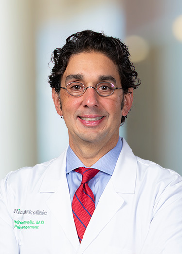 Andrew Revelis, M.D.