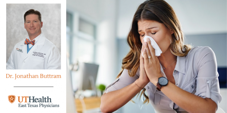 woman blowing her nose