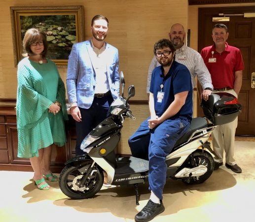 UT Health East Texas leaders replace moped to help an employee in need