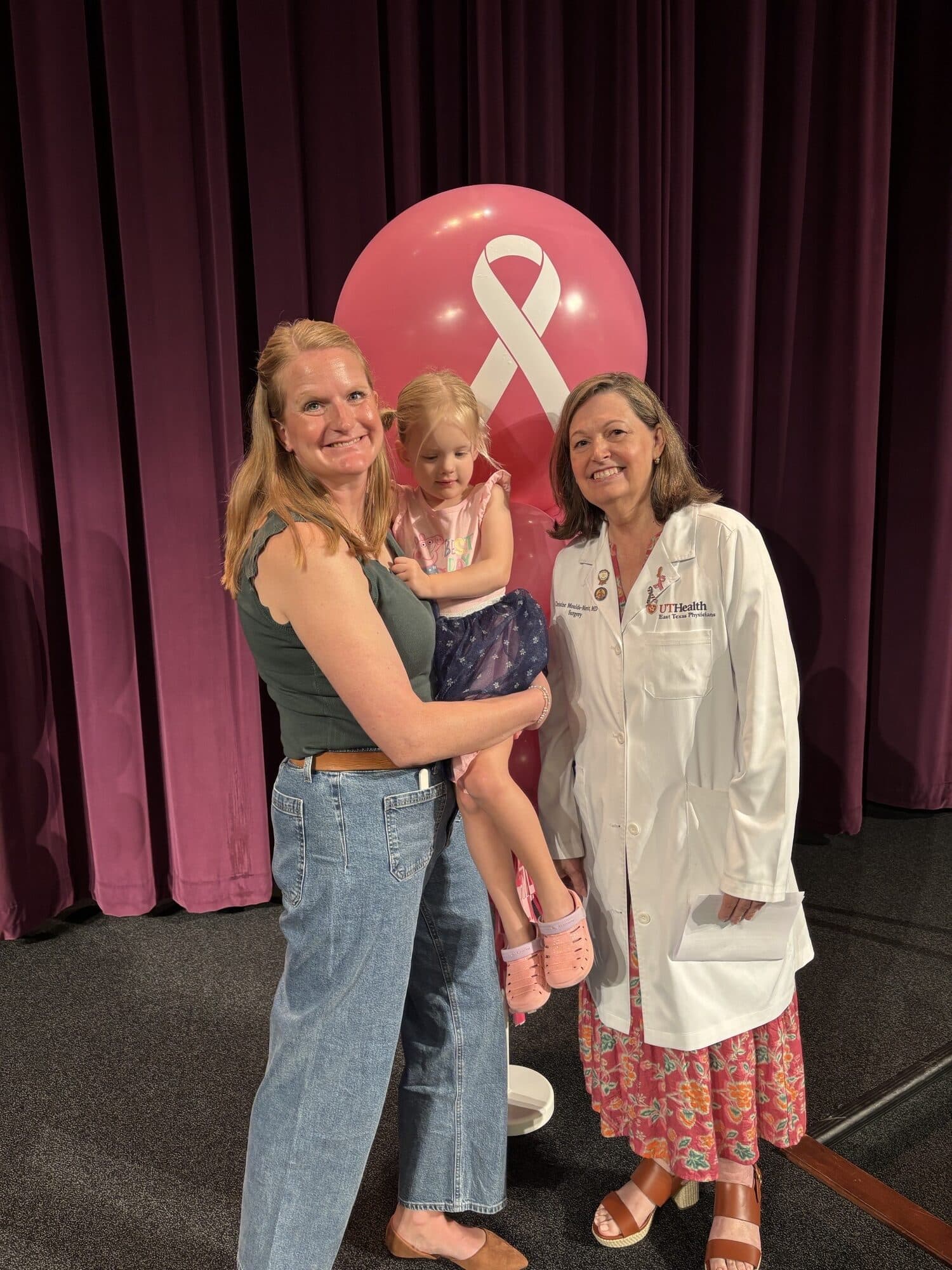 Kirsten Vulgamott and daughter Hazel with Dr. Christine Moulds-Merritt.